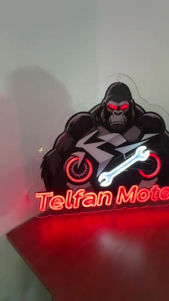 Logo de Telfan Motos en neón con impresión UV, hecho por Neón Pro